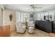 Comfortable sitting room with shuttered windows, tiled floor, and neutral decor at 250 Santa Maria St # 314, Venice, FL 34285