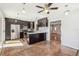 Stylish kitchen boasts stainless appliances, dark cabinets, and bright pendant lighting at 2555 Yucca Rd, Venice, FL 34293