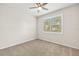 Bedroom with carpeted floors and a window for natural light at 260 Soliera St, Nokomis, FL 34275