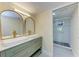 Updated bathroom with a double vanity and a glass shower at 2718 Orchid Oaks Dr # C-202, Sarasota, FL 34239