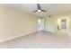 This bedroom features updated floors and neutral walls at 2718 Orchid Oaks Dr # C-202, Sarasota, FL 34239