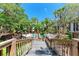 Lush landscaping surrounds this community pool at 2718 Orchid Oaks Dr # C-202, Sarasota, FL 34239
