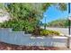 Orchid Oaks signage surrounded by lush landscaping at 2718 Orchid Oaks Dr # C-202, Sarasota, FL 34239