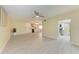 Living room featuring tile floors, recessed lights, and modern finishes at 2718 Orchid Oaks Dr # C-202, Sarasota, FL 34239