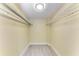 A walk-in closet with updated floors and wire shelving is move-in ready at 2718 Orchid Oaks Dr # C-202, Sarasota, FL 34239