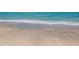 Beautiful beach view with clear blue water and light colored sand at 29704 Niagara Court, Englewood, FL 34223