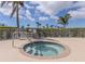 Community hot tub perfect for relaxing with an adjacent table and chairs at 29704 Niagara Court, Englewood, FL 34223