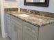 Close-up of bathroom vanity with granite countertops at 333 The Esplanade N # 102, Venice, FL 34285