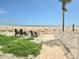 Beach view with chairs and a short walk to the ocean, located within the community at 333 The Esplanade N # 102, Venice, FL 34285