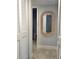 Hallway with linen closet and bathroom at 333 The Esplanade N # 102, Venice, FL 34285