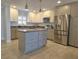 Open kitchen featuring granite countertops, and stainless steel appliances at 333 The Esplanade N # 102, Venice, FL 34285