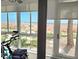 Enclosed patio with view to beach, bicycle, and exterior at 333 The Esplanade N # 102, Venice, FL 34285