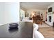 Inviting living room featuring a fireplace, stylish decor, and wood flooring for a cozy ambiance at 3340 Webber St, Sarasota, FL 34239