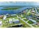 Waterfront homes with boat docks along interconnected canals offer scenic views and convenient access to waterways at 3376 Peace River Dr, Punta Gorda, FL 33983