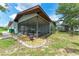 Outdoor living: screened lanai and a pool, offering space for relaxation at 3376 Peace River Dr, Punta Gorda, FL 33983