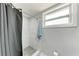 Modern bathroom with marble tile shower and fixtures at 3376 Peace River Dr, Punta Gorda, FL 33983