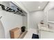 Walk-in closet with granite topped vanity and fixtures at 3376 Peace River Dr, Punta Gorda, FL 33983