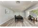 Formal dining room with ample seating and natural light at 3376 Peace River Dr, Punta Gorda, FL 33983