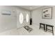 Spacious foyer with bright tile floors and double-door entryway at 3376 Peace River Dr, Punta Gorda, FL 33983