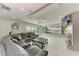 Large living room with tile flooring, fireplace, and backyard views at 3376 Peace River Dr, Punta Gorda, FL 33983