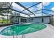 Inviting screened-in pool area for outdoor relaxation and fun at 3376 Peace River Dr, Punta Gorda, FL 33983