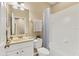 Bright bathroom with a single sink vanity, a mirror, and a shower-tub combo, designed for daily use at 3633 Parkridge Cir # 10-201, Sarasota, FL 34243