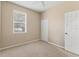 Cozy bedroom with a window and closet for storage at 3633 Parkridge Cir # 10-201, Sarasota, FL 34243