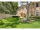 Charming townhome exterior with well-maintained lawn and beautiful landscaping at 3633 Parkridge Cir # 10-201, Sarasota, FL 34243