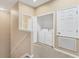 Bright laundry room with a washer and dryer at 3633 Parkridge Cir # 10-201, Sarasota, FL 34243