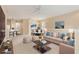 Bright living room featuring neutral tones, modern decor, and an open floor plan, perfect for entertaining at 3633 Parkridge Cir # 10-201, Sarasota, FL 34243