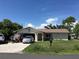 Charming single-story home with a well-manicured lawn and covered entry, offering curb appeal at 3661 Sterling Rd, Venice, FL 34293