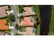Aerial showing a home with a screened-in pool and well-maintained landscaping at 4308 Via Del Santi, Venice, FL 34293