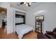 This bedroom features a built-in Murphy bed, decorative window, and entertainment center at 4308 Via Del Santi, Venice, FL 34293