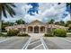 Beautiful community building with manicured landscaping at 4308 Via Del Santi, Venice, FL 34293