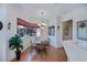 Cozy dining area with metal chairs, natural light, and stylish chandelier at 4308 Via Del Santi, Venice, FL 34293