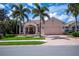 Beautiful single-Gathering home with a brick driveway and pristine landscaping at 4308 Via Del Santi, Venice, FL 34293