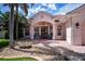 Attractive home with a double-door entry and lovely front yard landscaping at 4308 Via Del Santi, Venice, FL 34293