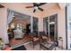 Inviting lanai with stylish outdoor furniture and views of the home's interior at 4308 Via Del Santi, Venice, FL 34293