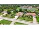 Well-maintained single-story home featuring a screened pool and manicured landscaping at 435 Boundary Blvd, Rotonda West, FL 33947