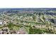 Scenic aerial view of a beautiful residential neighborhood with canals and golf courses at 435 Boundary Blvd, Rotonda West, FL 33947