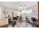 Bedroom space with chair, natural light, and wooden floors at 435 Boundary Blvd, Rotonda West, FL 33947