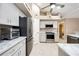 Spacious kitchen features stainless steel appliances, pantry, and marble countertops at 435 Boundary Blvd, Rotonda West, FL 33947