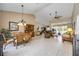 Spacious living room with high ceilings, tile flooring, and large windows, offering lots of natural light at 435 Boundary Blvd, Rotonda West, FL 33947