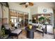 Relaxing covered patio area perfect for outdoor dining or lounging with comfortable seating and pleasant views at 435 Boundary Blvd, Rotonda West, FL 33947