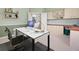 Bright home office with built-in cabinets and shelving, offering ample storage and workspace at 467 Sherbrooke Ct, Venice, FL 34293
