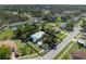An aerial view of the single-story home showcasing its well-manicured lawn and neighborhood at 4688 Maraldo Ave, North Port, FL 34287