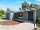Inviting front entrance with a well-manicured lawn, paved walkway, and attached garage at 4688 Maraldo Ave, North Port, FL 34287