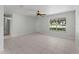 Bright living room with tile flooring and a large window at 4688 Maraldo Ave, North Port, FL 34287