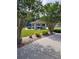 Community pavilion with covered seating, providing a shady spot in a park-like setting at 482 Pendleton Pl, Venice, FL 34292