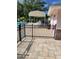 Community pool area featuring a shaded canopy and well-maintained facilities at 482 Pendleton Pl, Venice, FL 34292
